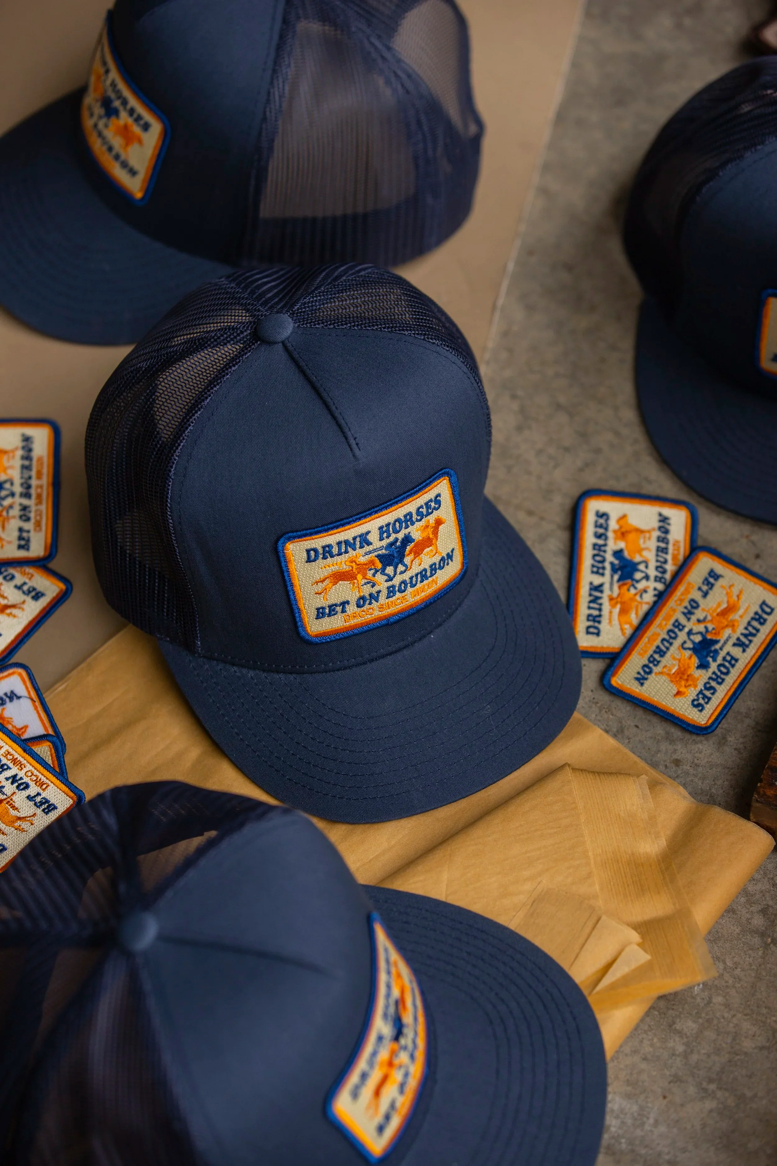 Drink Horses Bet on Bourbon Trucker Hat Navy - Image 11