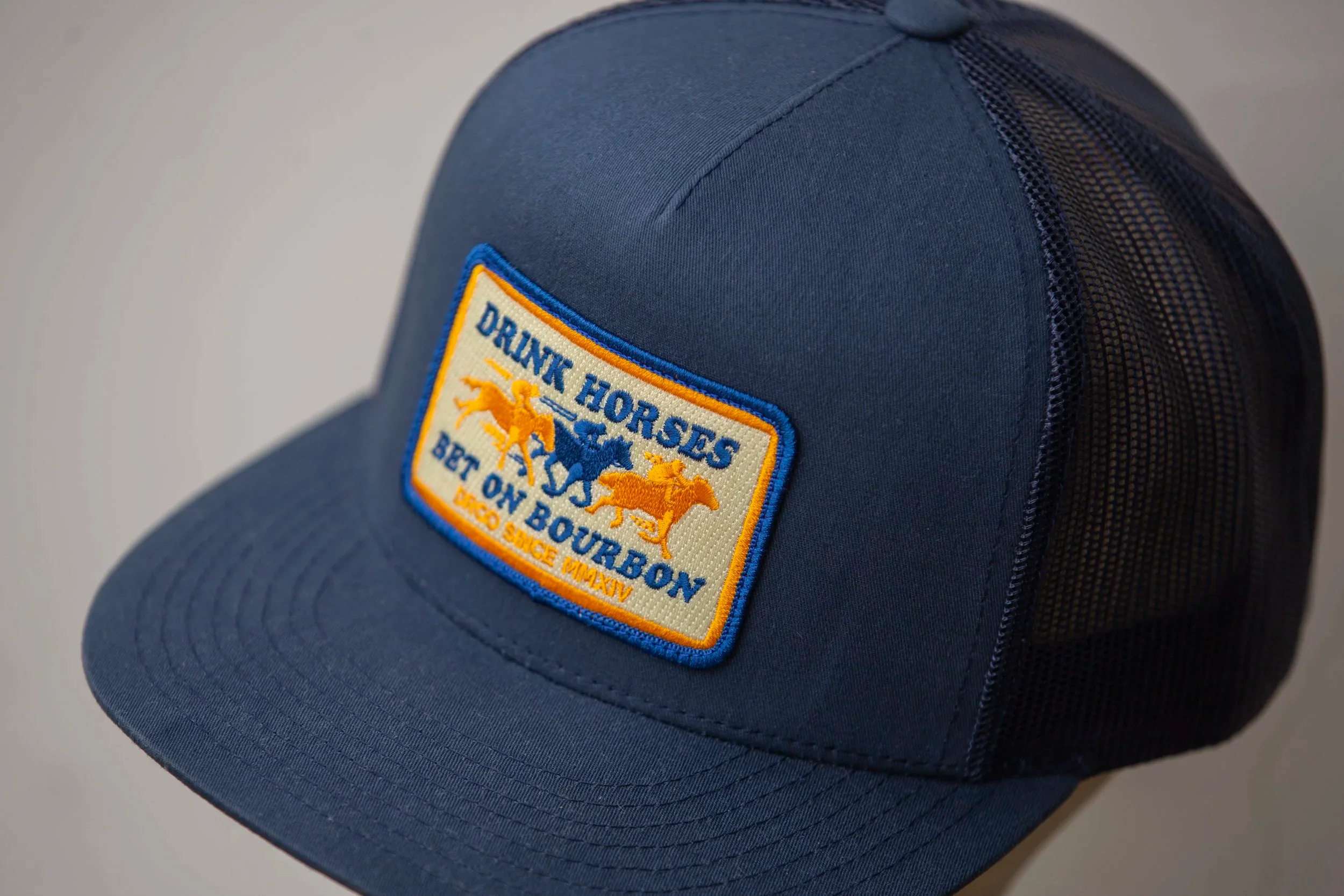Drink Horses Bet on Bourbon Trucker Hat Navy - Image 12