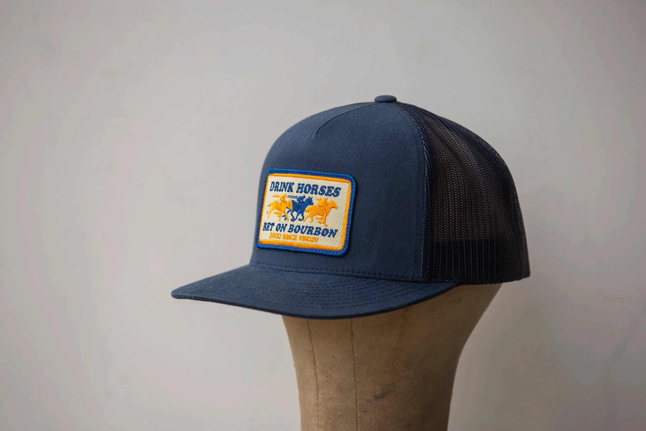 Drink Horses Bet on Bourbon Trucker Hat Navy - Image 7