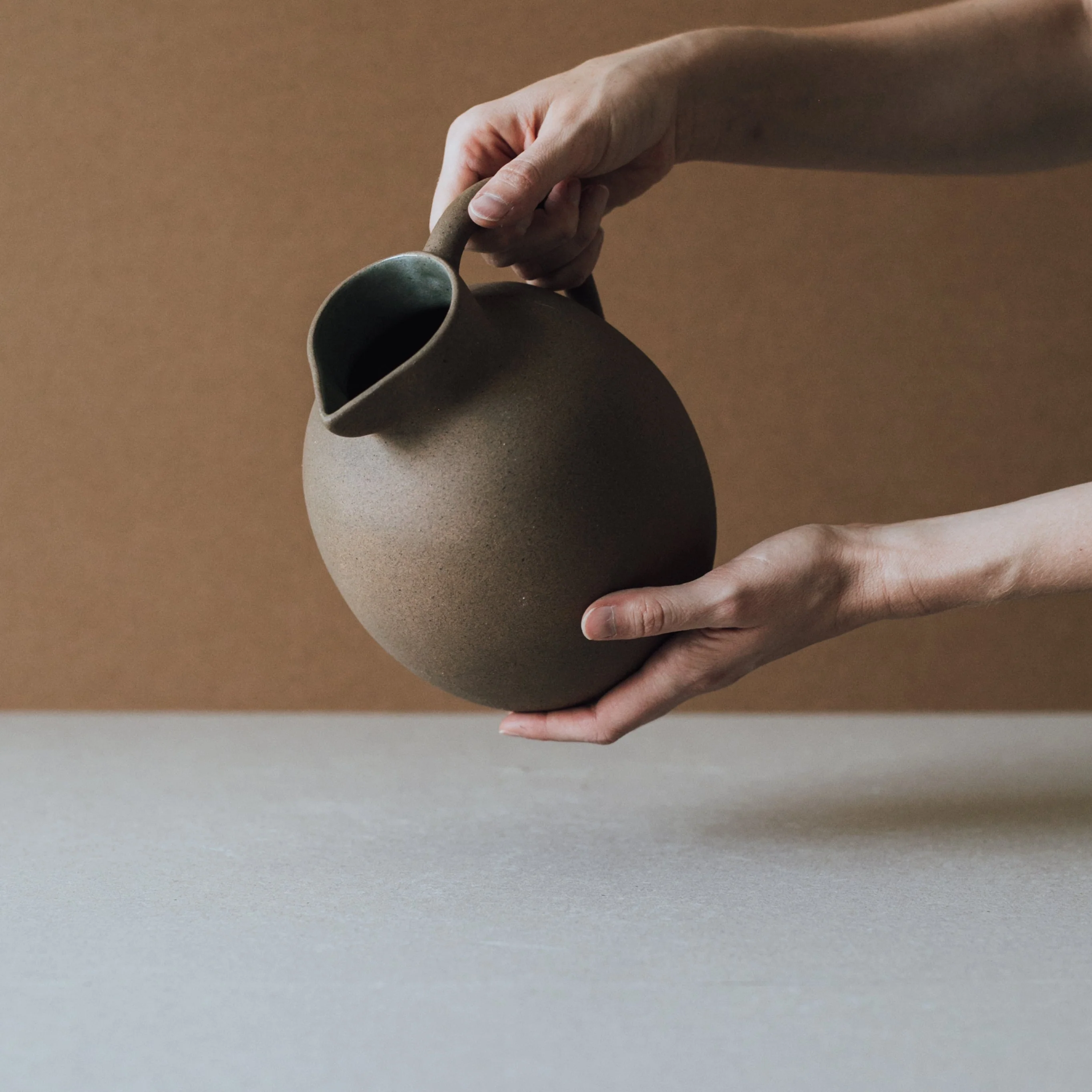 Handcrafted Ball Pitcher - Image 2