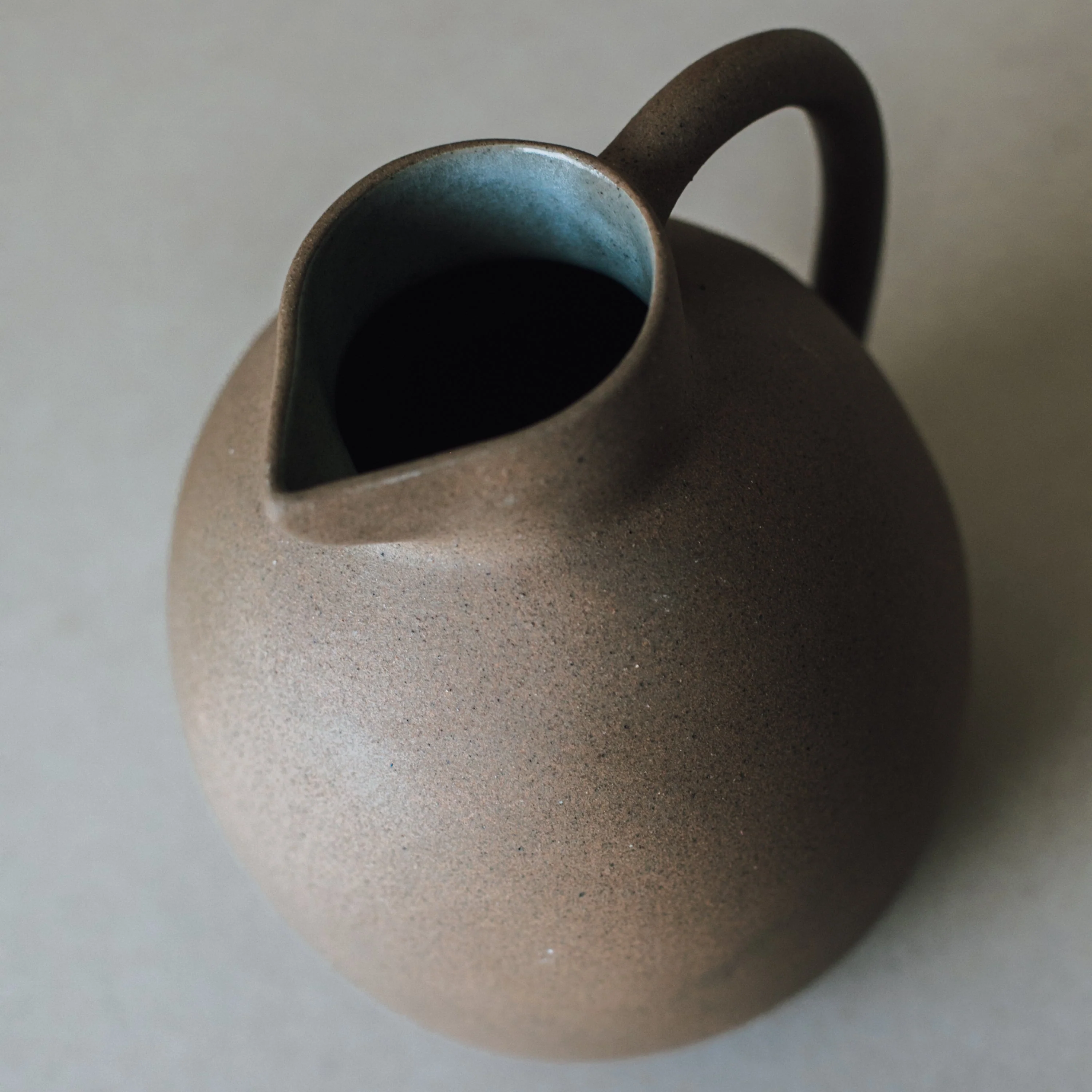 Handcrafted Ball Pitcher - Image 3